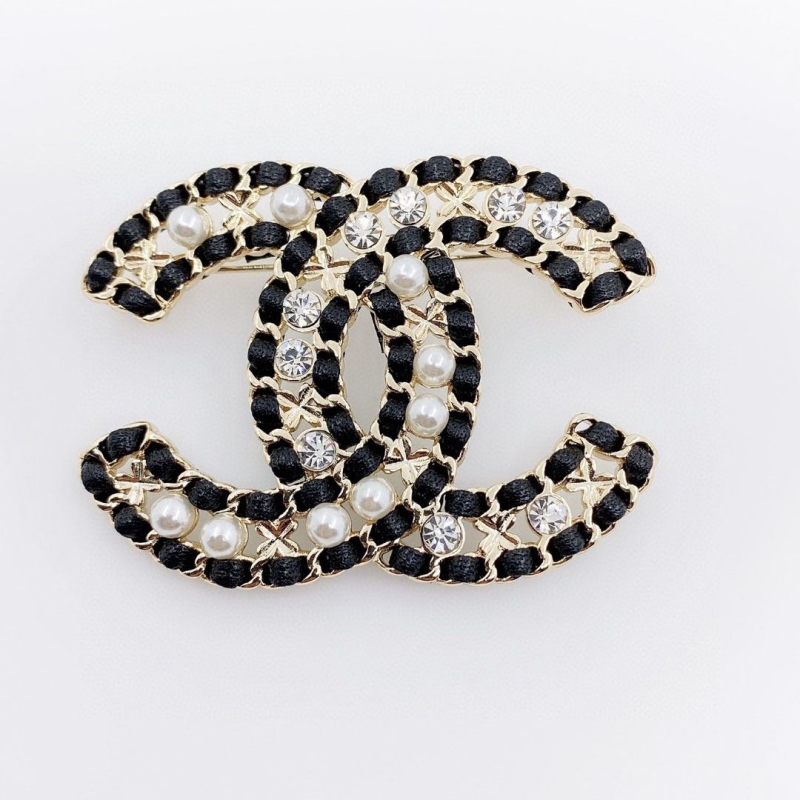 Ch*el brooches